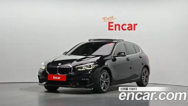 BMW 1-Series 2023 — photo 1