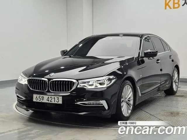 BMW 5-Series 2018 — photo 1