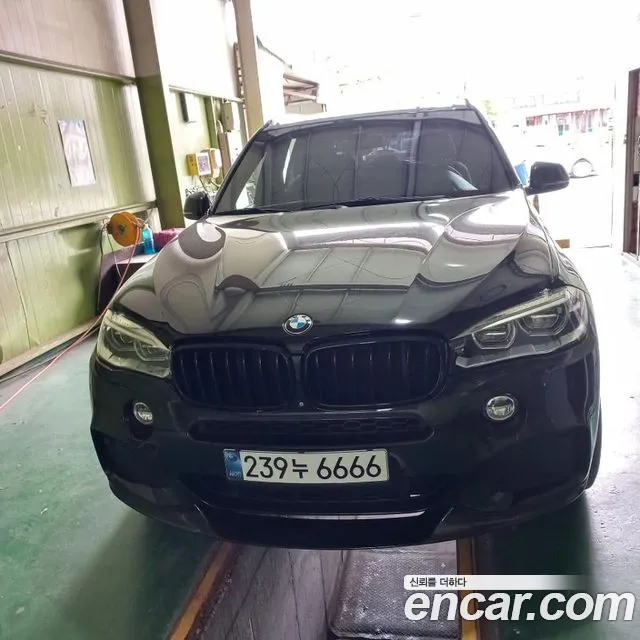 BMW X5 2015 — photo 1