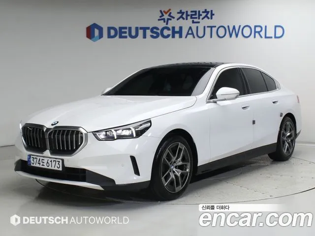 BMW 5-Series 2024 — photo 1