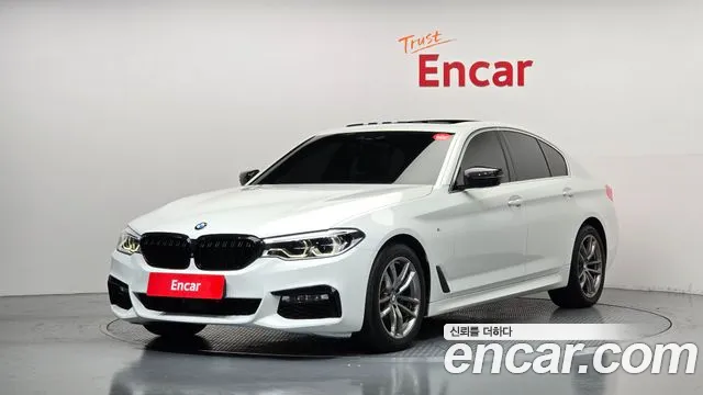 BMW 5-Series 2018 — photo 1