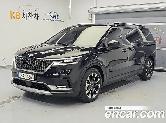 Kia Canival 2023 — photo 1