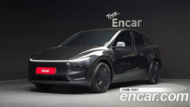 Tesla Model Y 2025 — photo 1