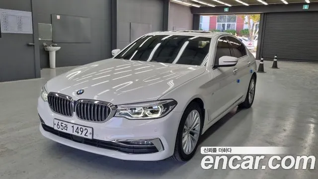 BMW 5-Series 2018 — photo 1