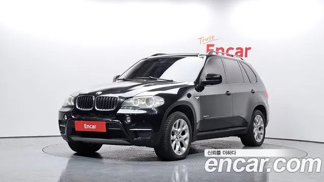 BMW X5 2012 — photo 1