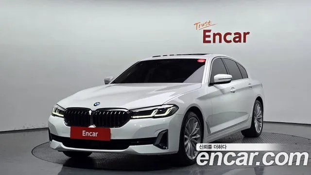 BMW 5-Series 2023 — photo 1