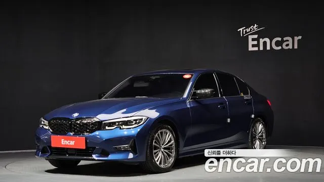 BMW 3-Series 2022 — photo 1