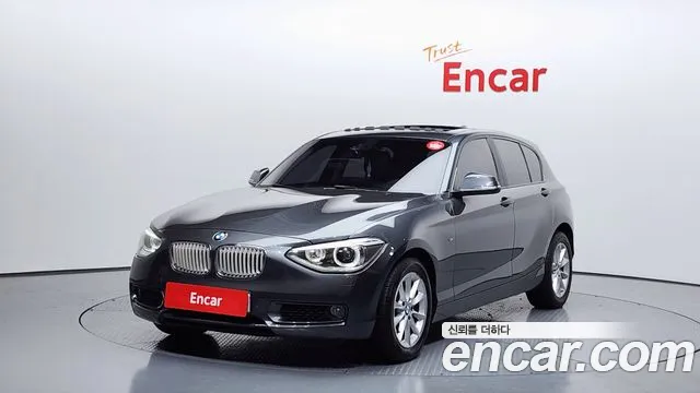 BMW 1-Series 2014 — photo 1