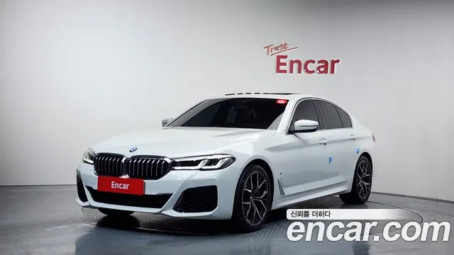 BMW 5-Series 2022 — photo 1