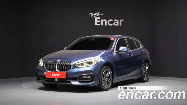 BMW 1-Series 2021 — photo 1