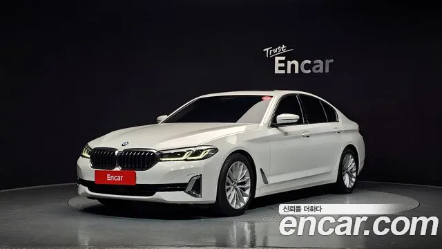 BMW 5-Series 2023 — photo 1