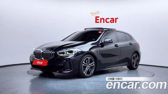 BMW 1-Series 2022 — photo 1