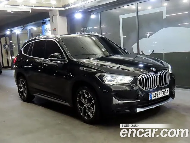 BMW X1 2021 — photo 1
