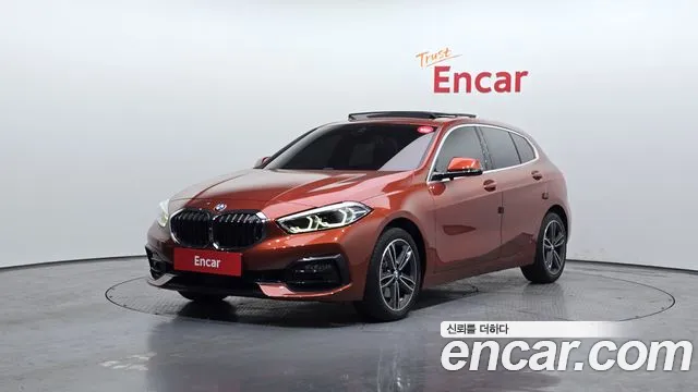 BMW 1-Series 2021 — photo 1