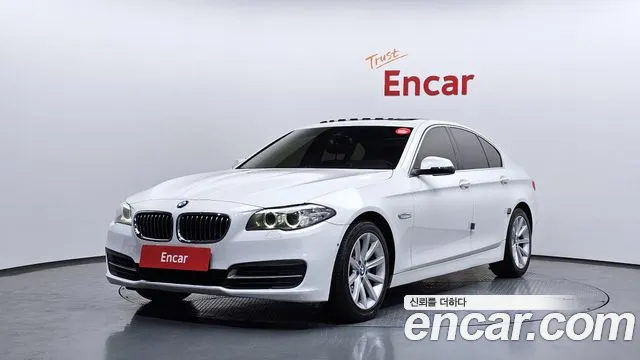 BMW 5-Series 2015 — photo 1