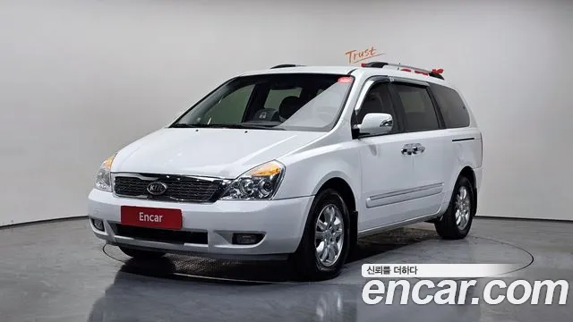 Kia Canival 2012 — photo 1