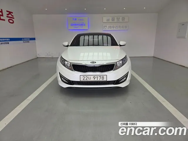 Kia K5 2011 — photo 1