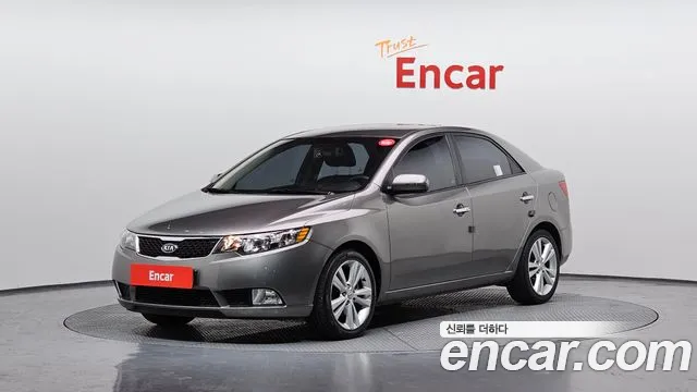 Kia Porte 2011 — photo 1