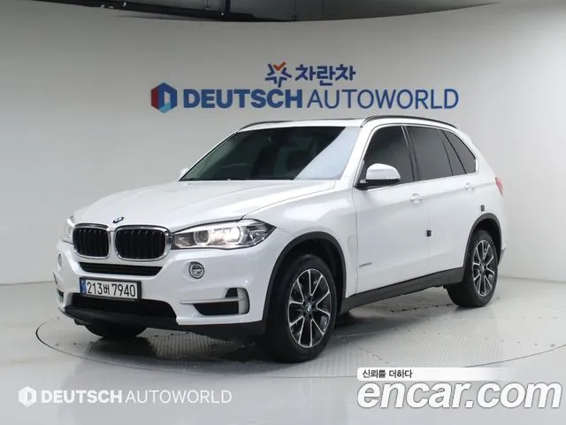 BMW X5 2014 — photo 1