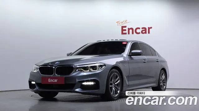 BMW 5-Series 2018 — photo 1