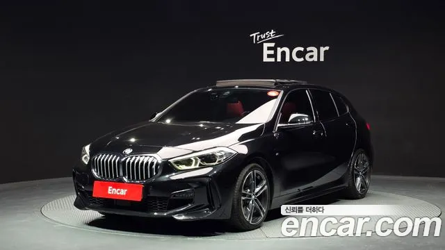 BMW 1-Series 2021 — photo 1