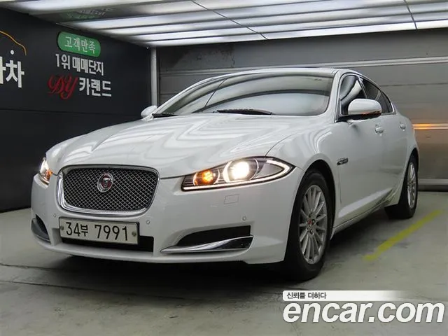 Jaguar XF 2014 — photo 1