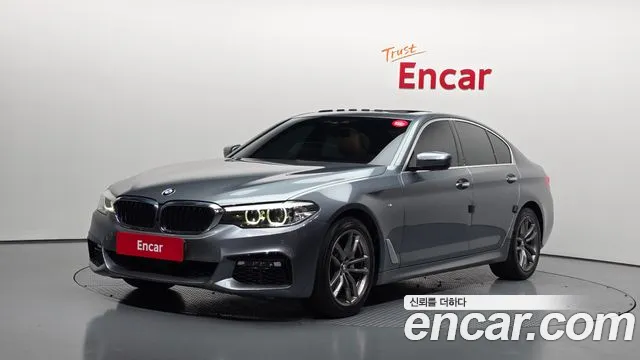 BMW 5-Series 2018 — photo 1