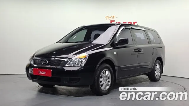 Kia Canival 2009 — photo 1