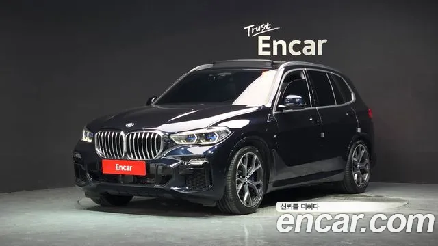 BMW X5 2021 — photo 1