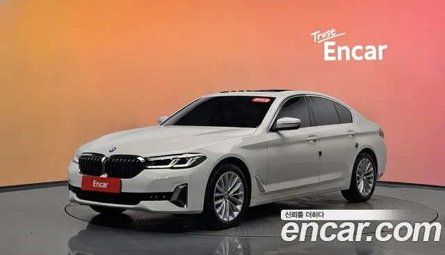BMW 5-Series 2021 — photo 1