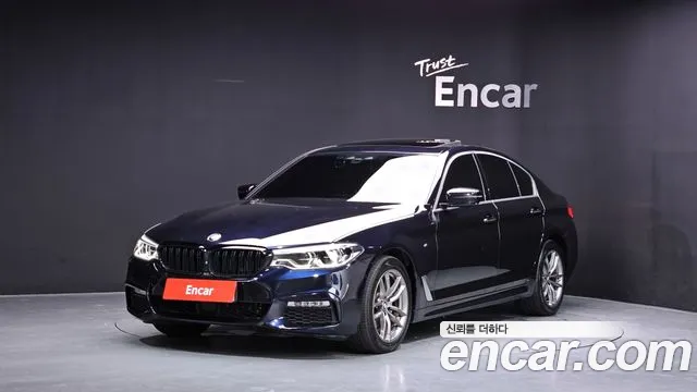 BMW 5-Series 2018 — photo 1