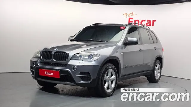 BMW X5 2011 — photo 1