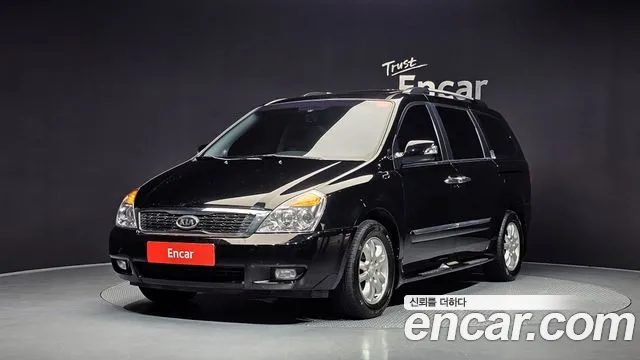 Kia Canival 2012 — photo 1