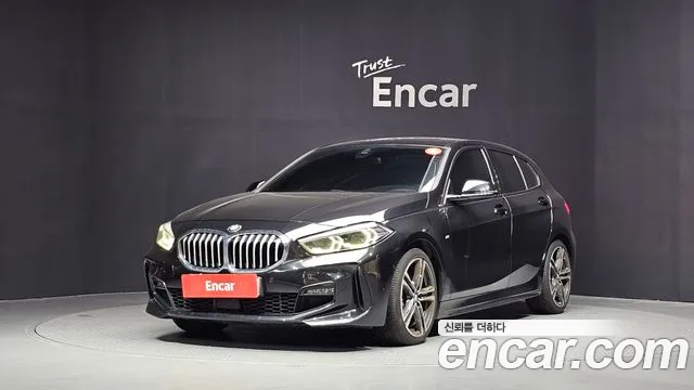 BMW 1-Series 2021 — photo 1