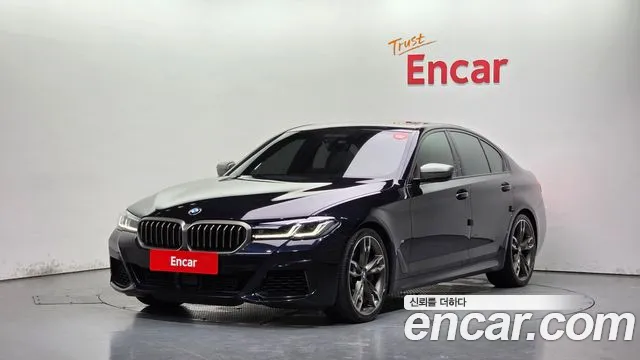 BMW 5-Series 2021 — photo 1