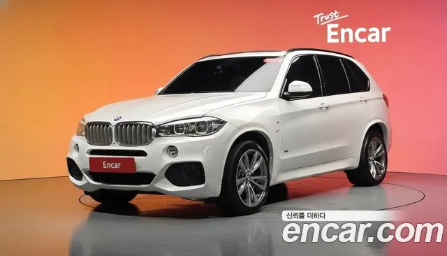 BMW X5 2014 — photo 1