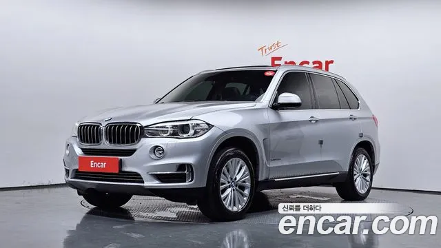 BMW X5 2014 — photo 1