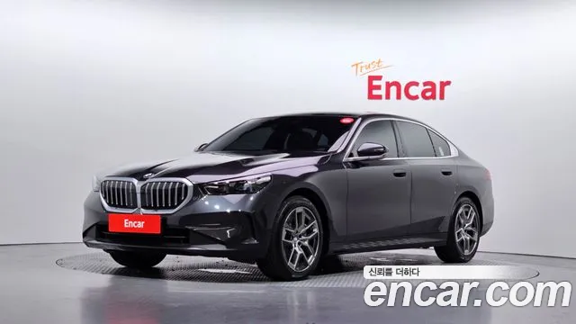 BMW 5-Series 2024 — photo 1