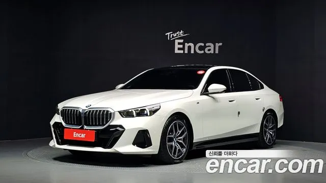 BMW 5-Series 2024 — photo 1