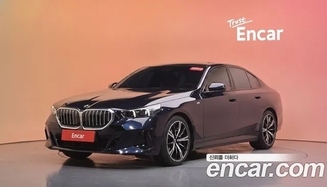 BMW 5-Series 2024 — photo 1
