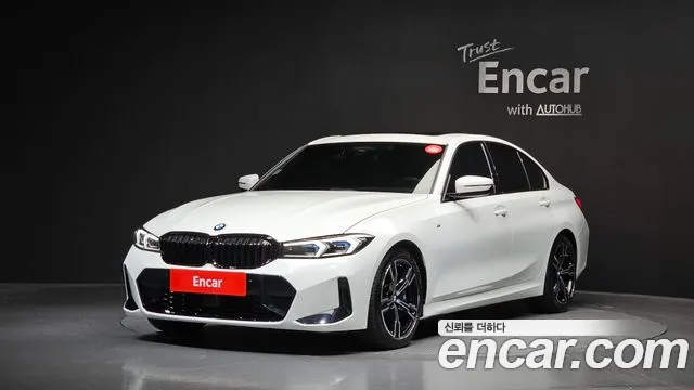 BMW 3-Series 2023 — photo 1