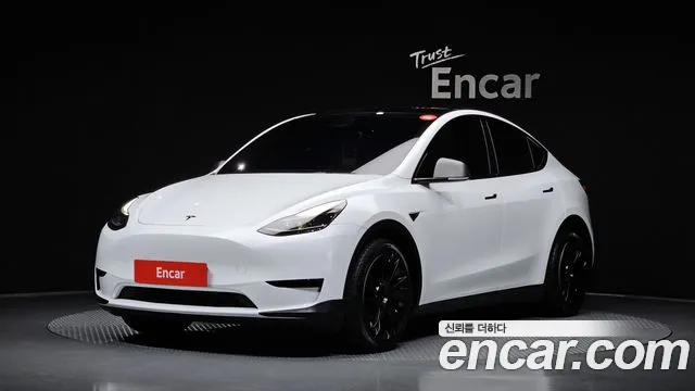 Tesla Model Y 2024 — photo 1