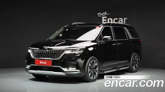 Kia Canival 2023 — photo 1