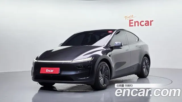 Tesla Model Y 2025 — photo 1