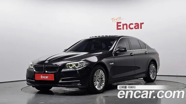 BMW 5-Series 2014 — photo 1