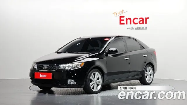 Kia Porte 2011 — photo 1