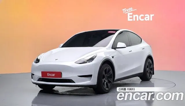 Tesla Model Y 2023 — photo 1