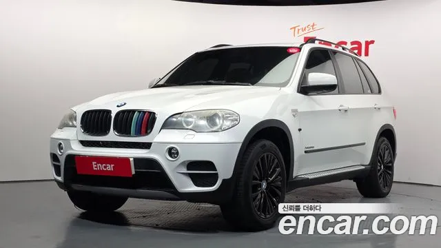BMW X5 2011 — photo 1