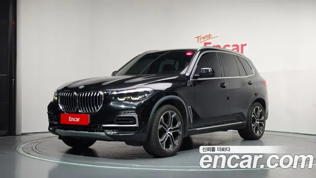 BMW X5 2021 — photo 1