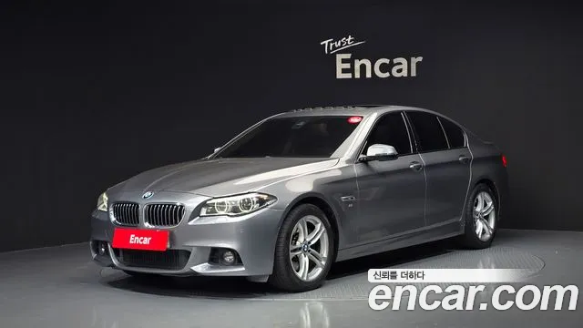 BMW 5-Series 2015 — photo 1